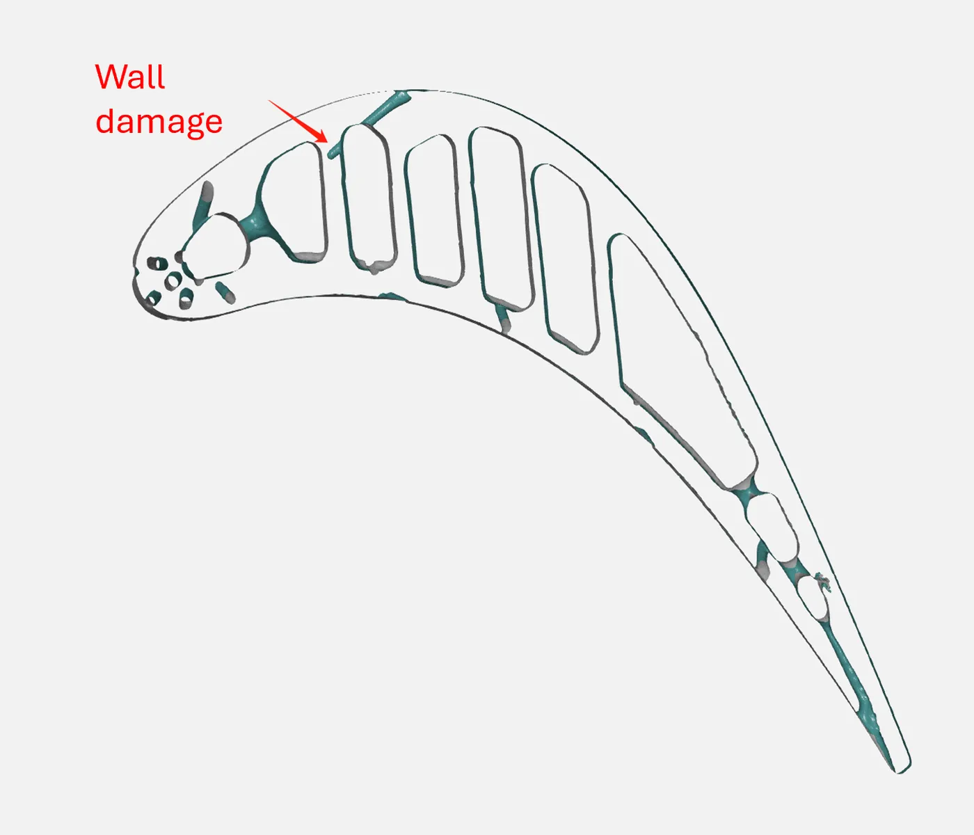 CT cross-section of a turbine blade with wall damage marked