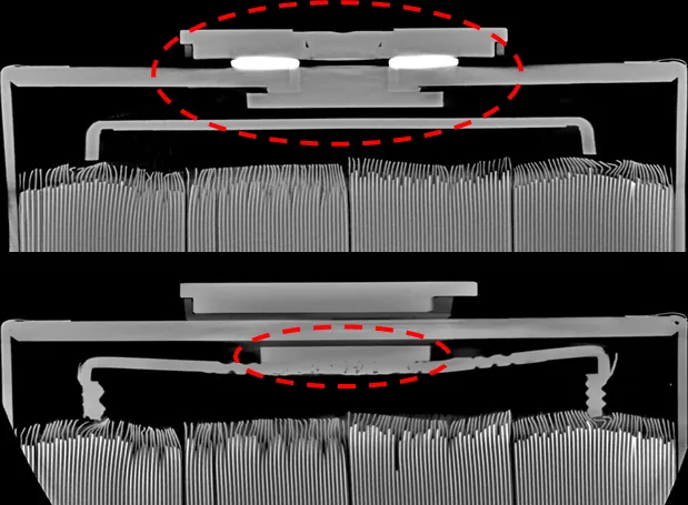 CT slices through the cover and terminal of a prismatic battery cell