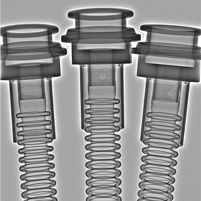2D X-ray image of three quick connectors with bellows